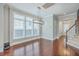 Spacious living room featuring hardwood floors, natural light and a view of the staircase at 310 Marchman St, Summerville, SC 29486