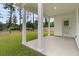 Covered back porch with large support beams perfect for outdoor gatherings and enjoying the private backyard at 3222 Pinewood Dr, Ladson, SC 29456