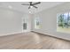 Spacious living room with hardwood floors, ceiling fan and natural light creates a cozy and inviting atmosphere at 3222 Pinewood Dr, Ladson, SC 29456