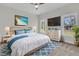 Serene main bedroom with beach decor, large windows, and cozy carpet for a relaxing retreat at 3222 Pinewood Dr, Ladson, SC 29456