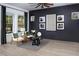 Stylish living room with natural light, modern decor, neutral color palette, and a comfortable seating area at 330 Trailmore Ln, Summerville, SC 29486