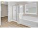 Bathroom features a tub, shower, and a window that brings in lots of natural light at 340 Albrighton Way, Moncks Corner, SC 29461