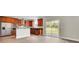 Modern kitchen featuring stainless steel appliances, granite countertops, and a sliding door to the backyard at 340 Albrighton Way, Moncks Corner, SC 29461