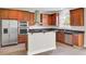 Well-equipped kitchen with stainless steel appliances, dark countertops, and ample cabinet space for storage at 340 Albrighton Way, Moncks Corner, SC 29461