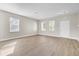 Expansive living room with neutral walls and ample natural light, ready for your personal touch at 340 Albrighton Way, Moncks Corner, SC 29461