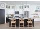 Modern kitchen with stainless steel appliances, a large island with bar seating, and stylish pendant lighting at 342 Trailmore Ln, Summerville, SC 29486