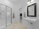 Bathroom featuring a glass door shower and pedestal sink at 3520 E Higgins Dr, Mount Pleasant, SC 29466
