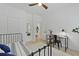 Bedroom featuring a bed, desk, and closet with mirror door at 3520 E Higgins Dr, Mount Pleasant, SC 29466