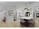 Modern kitchen with stainless steel appliances, white cabinets, and a large center island with seating at 3520 E Higgins Dr, Mount Pleasant, SC 29466