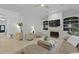 Bright living room featuring a fireplace with built-in shelves and stylish furniture at 3520 E Higgins Dr, Mount Pleasant, SC 29466