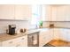 Bright kitchen features white cabinets, subway tile backsplash, granite counters, and stainless steel appliances at 3707 Gambrill Ln, Mount Pleasant, SC 29466