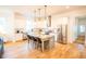 Open kitchen featuring an island with bar stool seating, granite countertops, and stainless steel appliances at 3707 Gambrill Ln, Mount Pleasant, SC 29466