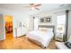 Spacious main bedroom with hardwood floors, large windows, and neutral tones for a relaxing atmosphere at 3707 Gambrill Ln, Mount Pleasant, SC 29466