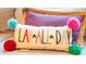 Close-up of decorative pillows with the words 'Play All Day' on the front at 3707 Gambrill Ln, Mount Pleasant, SC 29466