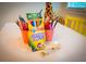 play table with colored pencils and art supplies with a giraffe in the background at 3707 Gambrill Ln, Mount Pleasant, SC 29466