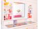 Modern vanity with storage shelves, drawers and a lighted mirror at 3707 Gambrill Ln, Mount Pleasant, SC 29466