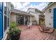 Brick backyard patio with sliding glass doors providing access to the home at 39 Indigo Ln, Goose Creek, SC 29445