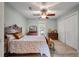 Charming bedroom with a ceiling fan, closet, wood floors, and natural light at 39 Indigo Ln, Goose Creek, SC 29445