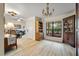 Inviting foyer features natural light, wood floors, and access to the main living spaces at 39 Indigo Ln, Goose Creek, SC 29445