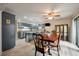 Spacious kitchen featuring an island and adjacent dining area with sliding glass doors at 39 Indigo Ln, Goose Creek, SC 29445