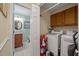 Functional laundry room with washer, dryer, and ample storage helps make chores a breeze at 39 Indigo Ln, Goose Creek, SC 29445