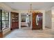 Spacious living room featuring an antique hutch, wardrobe, and views into the bedroom at 39 Indigo Ln, Goose Creek, SC 29445