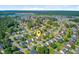 Overview of a residential area with beautiful lake views and abundant trees, promoting a serene living environment at 407 Glenmore Dr, Moncks Corner, SC 29461