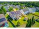 Backyard view of home featuring solar panels, shed, screened-in porch, and fenced-in yard at 407 Glenmore Dr, Moncks Corner, SC 29461