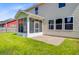 Enjoy the outdoors on this property's lovely patio adjacent to the screened in porch at 407 Glenmore Dr, Moncks Corner, SC 29461