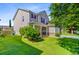 Charming two-story home with a well-maintained lawn and attractive landscaping in a serene setting at 407 Glenmore Dr, Moncks Corner, SC 29461