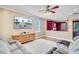 Open-concept living room with hardwood floors, neutral walls, and seamless flow to adjacent spaces at 407 Glenmore Dr, Moncks Corner, SC 29461