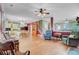 Open-concept living area showcases hardwood floors, a cozy fireplace, and easy access to the kitchen at 407 Glenmore Dr, Moncks Corner, SC 29461