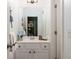 A bathroom featuring a white vanity with black pulls, and decoratively painted walls at 4073 Blackmoor St, Mount Pleasant, SC 29466