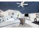 Cozy bedroom with a vaulted blue ceiling, a comfortable seating area, and ample natural light at 4073 Blackmoor St, Mount Pleasant, SC 29466