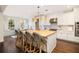 Open kitchen featuring a butcher block island, lots of natural light and connected dining space at 4073 Blackmoor St, Mount Pleasant, SC 29466