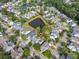 Aerial view of a residential neighborhood, featuring well-maintained homes and lush greenery at 4073 Blackmoor St, Mount Pleasant, SC 29466