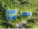 Aerial view of multiple outdoor tennis courts surrounded by mature trees and parking at 4073 Blackmoor St, Mount Pleasant, SC 29466
