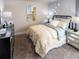 Comfortable bedroom featuring neutral walls, plush carpet, and soft, cozy bedding at 421 Radiant Blue Way, Summerville, SC 29486