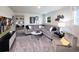 Cozy living room area with a large sectional sofa and a television at 421 Radiant Blue Way, Summerville, SC 29486