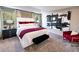 Spacious main bedroom with large windows, designer decor, and ample natural light at 421 Radiant Blue Way, Summerville, SC 29486