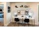 Efficient home office with built-in shelving, providing an organized workspace at 421 Radiant Blue Way, Summerville, SC 29486