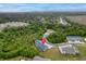 Aerial view showcases property location nestled between beautiful trees and a serene marsh at 5133 Park Creek Ave, North Charleston, SC 29418