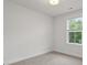 Bedroom features neutral walls and carpet, along with a large window for ample natural light at 5133 Park Creek Ave, North Charleston, SC 29418