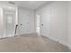 Upstairs hallway features carpet flooring, white walls and doors, and modern fixtures at 5133 Park Creek Ave, North Charleston, SC 29418