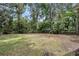 Over-sized level backyard featuring mature trees and plenty of space at 5172 Sterrett St, North Charleston, SC 29405