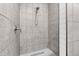 Close-up of a standalone shower with gray tile and modern fixtures at 5233 Maybank Hwy, Wadmalaw Island, SC 29487