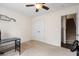 Bedroom featuring a closet, modern desk, neutral walls and carpet, and a ceiling fan for comfort at 535 Crossland Dr, Moncks Corner, SC 29461
