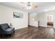 Comfortable loft area with a ceiling fan and hardwood floors at 535 Crossland Dr, Moncks Corner, SC 29461
