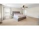 Spacious main bedroom with large windows and a ceiling fan at 535 Crossland Dr, Moncks Corner, SC 29461