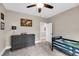 Bedroom featuring a single bed, and neutral-colored dresser, complemented by a ceiling fan at 5725 Caviar Ct, Johns Island, SC 29455